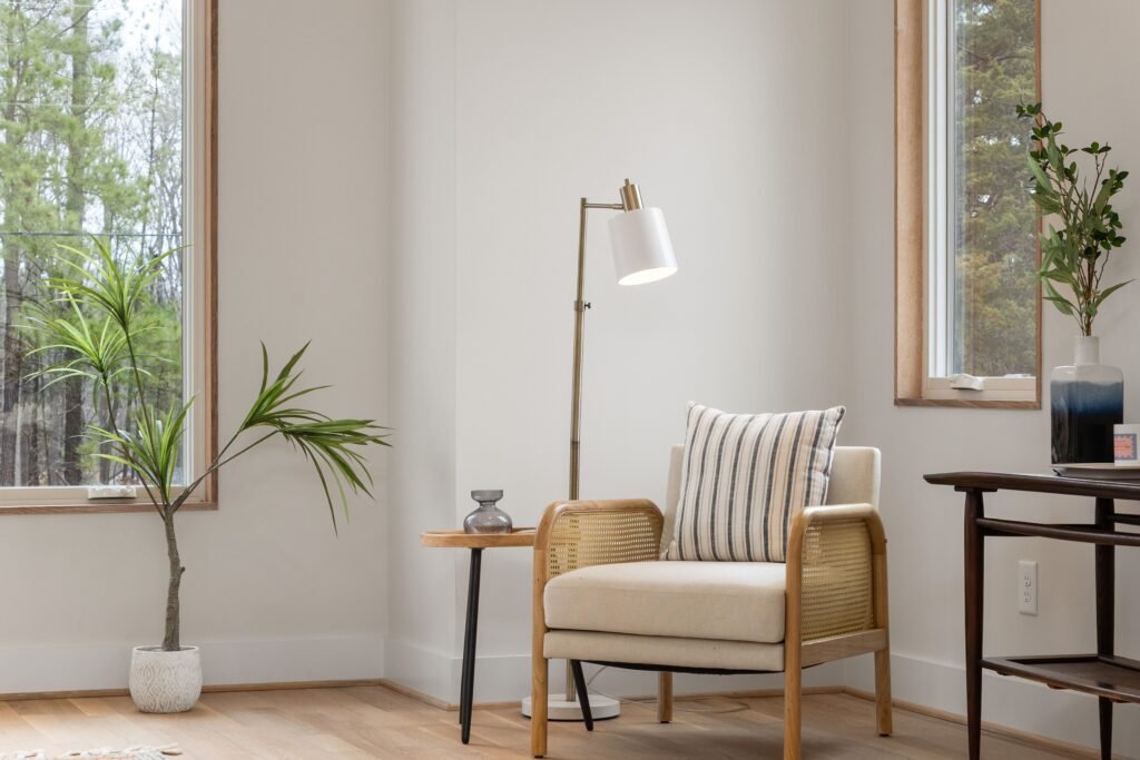 Living room with plants, natural materials and natural light.