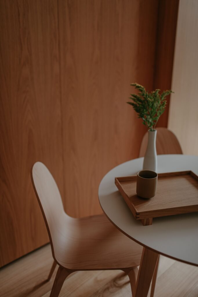 A natural wooden tray on a coffee table.